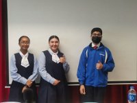 SEK debaters posing for photo after the contest